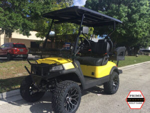 Yellow Aluma 4 Passenger Lifted Golf Cart affordable golf cart rental, golf cart rental fort myers, golf cart gallery