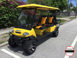 Yellow T-Sport 6 Passenger Lifted Golf Cart fort myers golf cart rental, street legal cart rental, florida golf cart